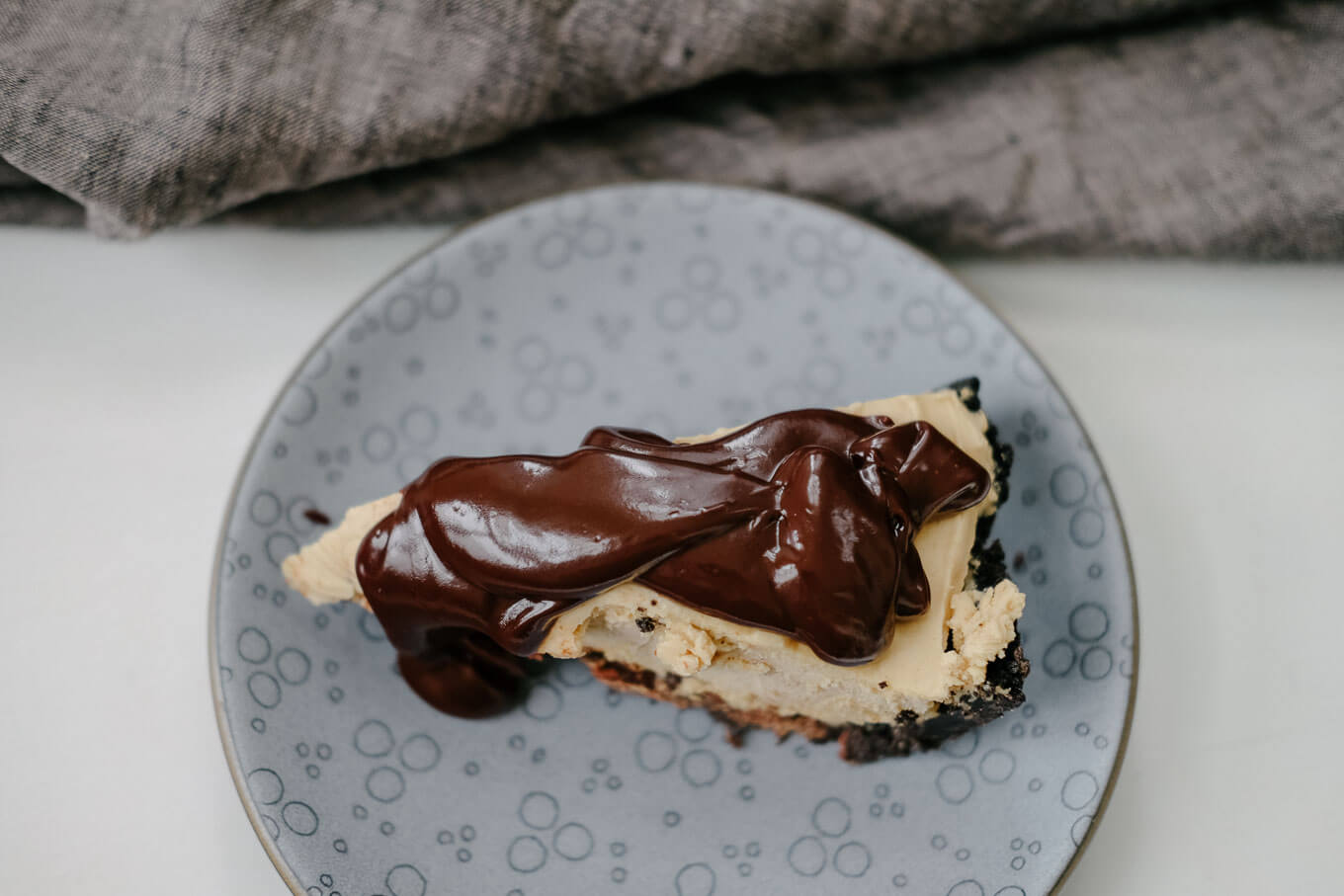 Peanut Butter Pie with Chocolate Cookie Crust and Easy Fudge Sauce